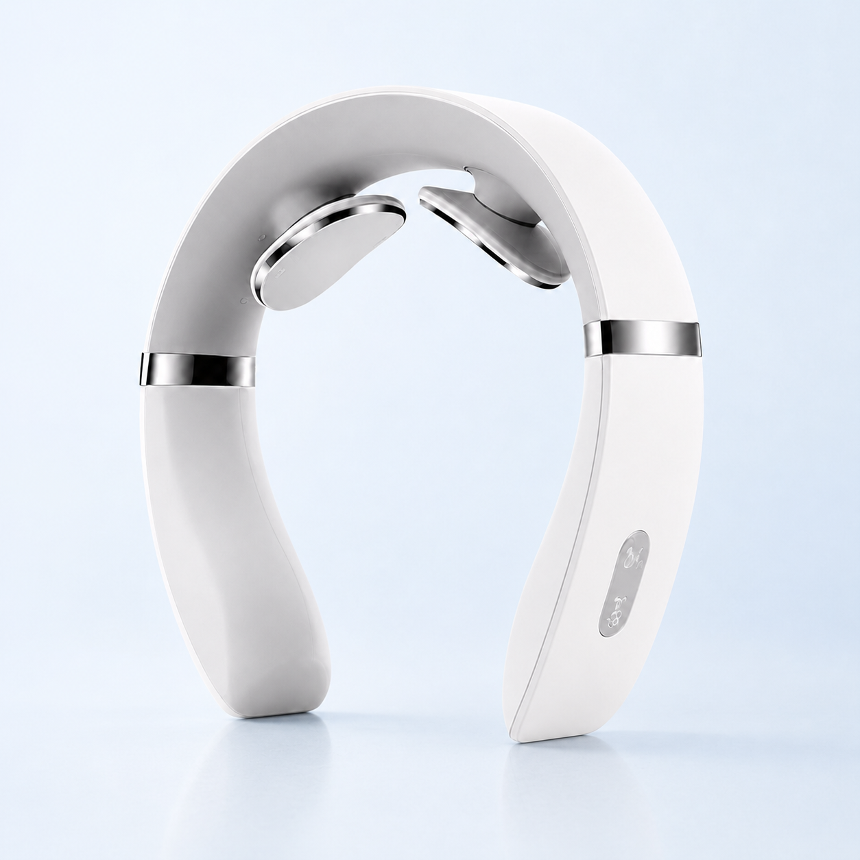 LOFTE Pulse white wearable neck massager with chrome details on a pale blue background